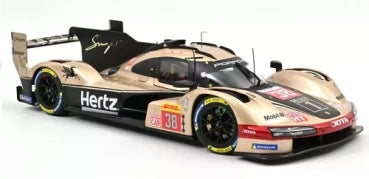 1:18 scale diecast model of a gold and black Le Mans prototype race car with detailed sponsor decals