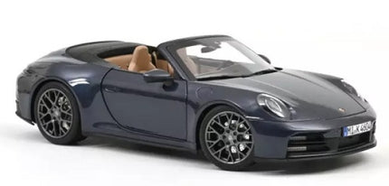1:18 scale dark blue Porsche convertible diecast model car with detailed wheels and tan interior