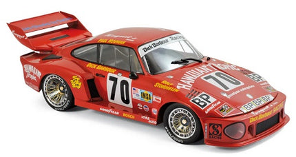 Red diecast race car model with number 70, detailed decals, large rear wing, and gold wheels.