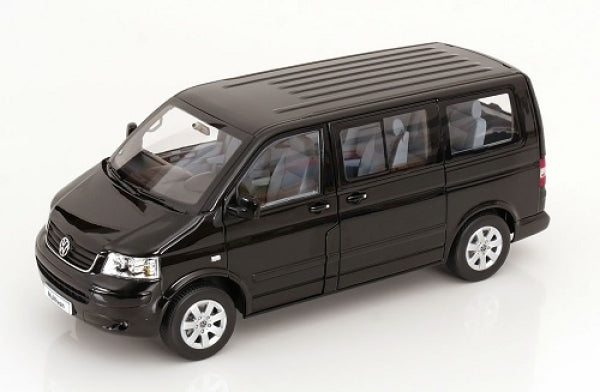 1:18 scale black diecast model van with detailed exterior and interior on white background