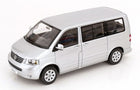 Silver 1:18 scale diecast model van with detailed exterior and black trim