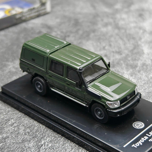Paragon Toyota Land Cruiser LC79 2014 1:64 Diecast Model Car - studio product photo of the scale model