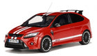 Red diecast model car with white racing stripes, sporty wheels, and rear spoiler, 1:18 scale.