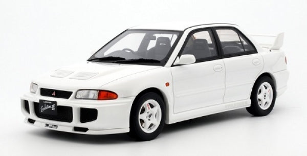 1:18 scale white Mitsubishi Lancer Evolution diecast model car with rear spoiler