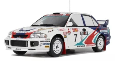 1:18 scale diecast rally car model, white with racing decals and number 7, detailed exterior