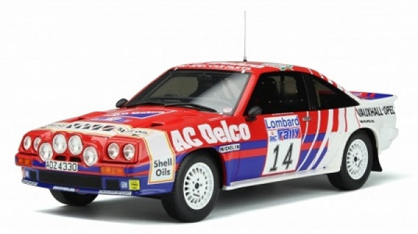 1:18 scale diecast rally car model with racing decals, spotlights, and number 14 livery