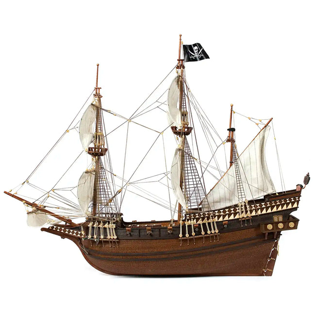 https://cdn.shopify.com/s/files/1/0622/6942/3871/files/OcCre_Maqueta_Barco_Madera_Buccaneer_lateral_65fc1200-3a08-4a9f-8c4b-c0530f5da8c8.webp?v=1774353299