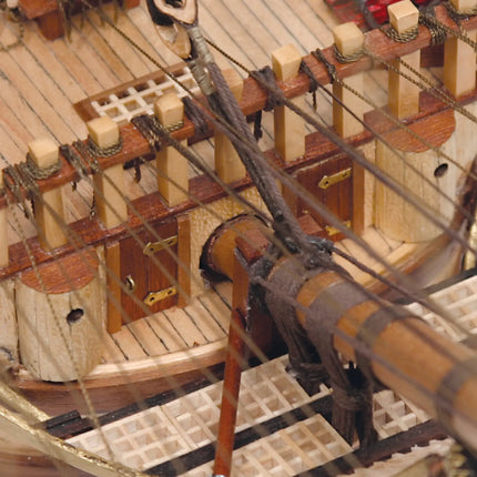 https://cdn.shopify.com/s/files/1/0622/6942/3871/products/OcCre_Maqueta_Barco_Madera_Santisima_Trinidad_Proa.webp?v=1740764149