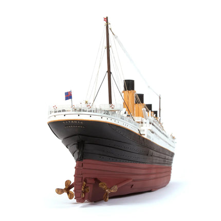 https://cdn.shopify.com/s/files/1/0622/6942/3871/products/OcCre_Maqueta_de_barco_madera_titanic_popa.webp?v=1761591628