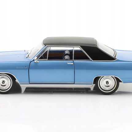 https://a.allegroimg.com/original/11fb67/6795d627419bb00fee484778b284/Opel-Diplomat-A-V8-Coupe-1965-Blue-WhiteBox-1-24-Niebieski-Model-Samochodu-Kod-producenta-WB124082