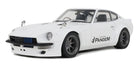 White diecast model car with wide body kit, black wheels, and Pandem logo on the door
