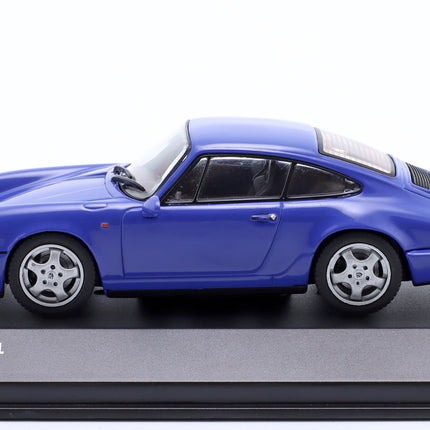 https://a.allegroimg.com/original/1176ca/1cb5494b47d39f931945d1115c17/Porsche-911-964-964-Carrera-RS-3-6-Coupe-1992-Maritime-Blue-Solido-1-43-Skala-skala-1-43