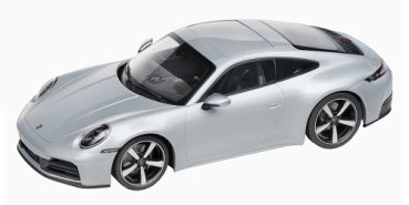 Silver Porsche 911 diecast model car, 1:18 scale, detailed exterior and wheels