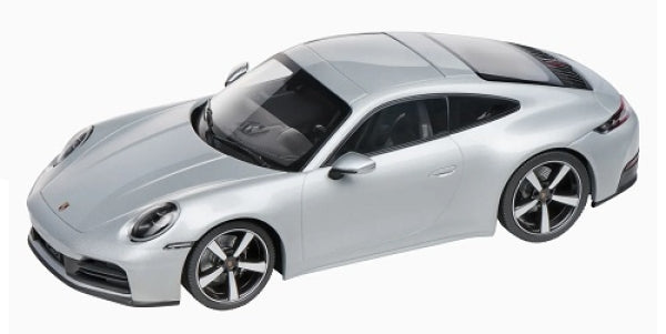 Silver Porsche 911 diecast model car 1:18 scale with black roof and detailed rims