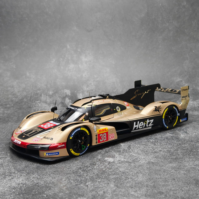 Norev Porsche 963 Hertz Team 2024 1:18 Diecast Model Car - studio product photo of the scale model
