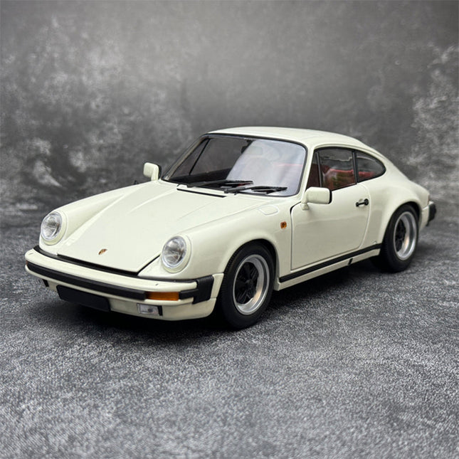 Minichamps Porsche 911 1983 Carrera 3.2 Targa 1:18 Diecast Model Car - studio product photo of the scale model