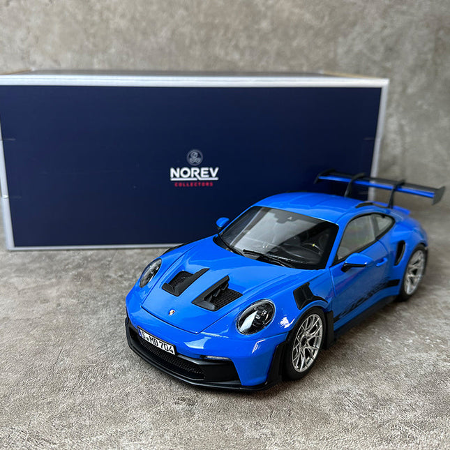 Norev Porsche 911 992 GT3 RS 2022 1:18 Diecast Model Car - studio product photo of the scale model