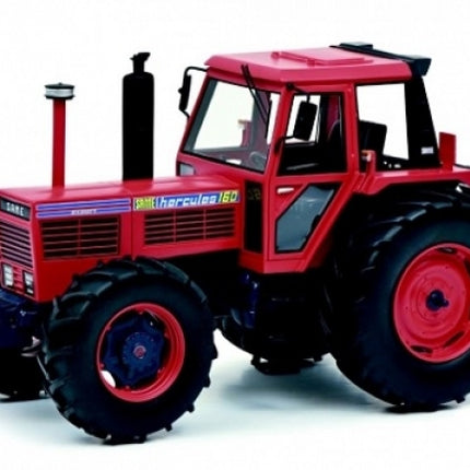 Red diecast model tractor with large black tires and detailed exterior design