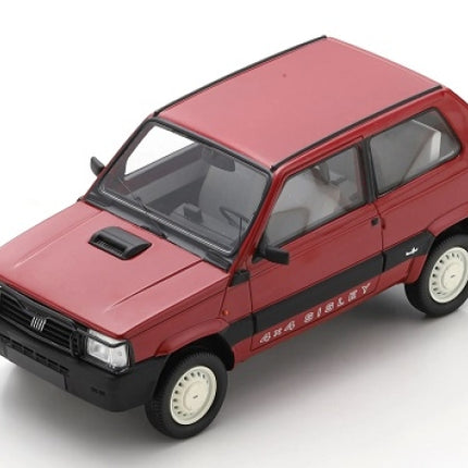 Red diecast model car, compact hatchback, 1:18 scale, detailed exterior, white wheels