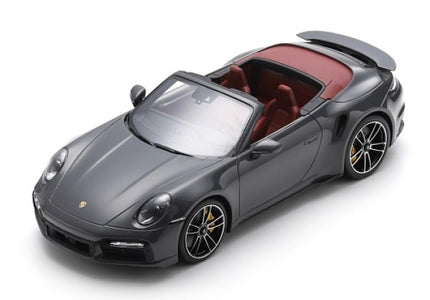 1:18 scale grey Porsche convertible diecast model car with red interior, angled view