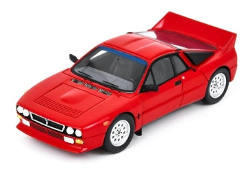Red diecast model rally car with wide rear spoiler, white wheels, and detailed exterior