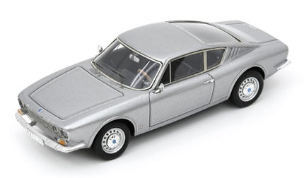 Silver classic diecast model car with detailed wheels and sleek coupe design