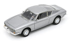 Silver classic diecast model car with detailed wheels and sleek coupe design