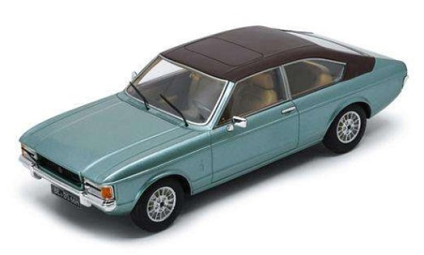 1:18 scale diecast model car, vintage coupe, metallic blue with black roof, detailed interior