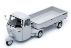 White three-wheeled diecast vintage pickup truck model with flatbed, 1:18 scale