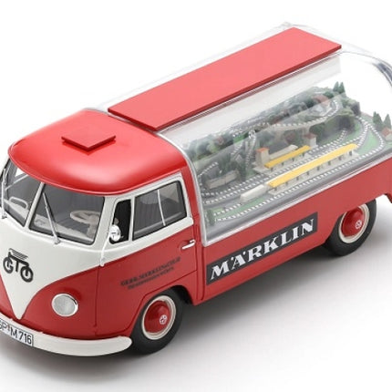 Red and white diecast Volkswagen model van with Marklin train display in clear case