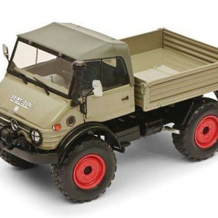 1:18 scale diecast model of a classic off-road utility truck with green cab and red wheels