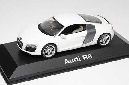 White Audi R8 diecast model car on display base, 1:18 scale collectible.