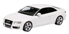 White diecast model car Audi coupe in 1:43 scale, detailed exterior, collectible toy.