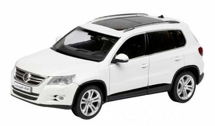 White diecast model SUV car with black roof and silver wheels, shown on white background