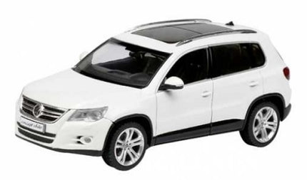 1:18 scale white SUV diecast model car with black roof and silver wheels