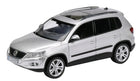 Silver diecast model SUV car with detailed exterior, 1:18 scale, black accents, sunroof