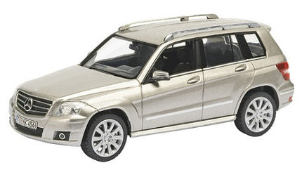 Silver diecast Mercedes-Benz SUV model car with detailed wheels and chrome grille