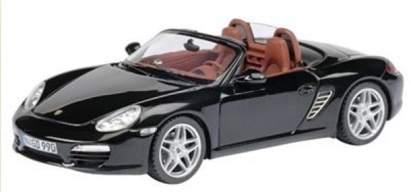 Black Porsche convertible 1:18 scale diecast model car with red interior, silver rims