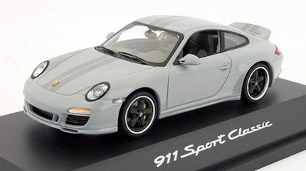 1:43 scale grey Porsche 911 Sport Classic diecast model car on display stand