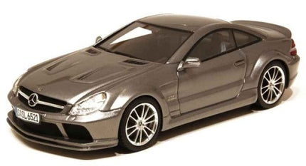 Diecast model car in metallic grey, detailed Mercedes-Benz coupe, 1:18 scale collectible