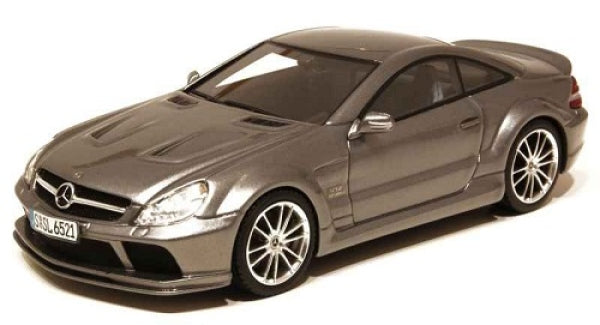 Diecast model car in metallic grey, detailed Mercedes-Benz coupe, 1:18 scale collectible