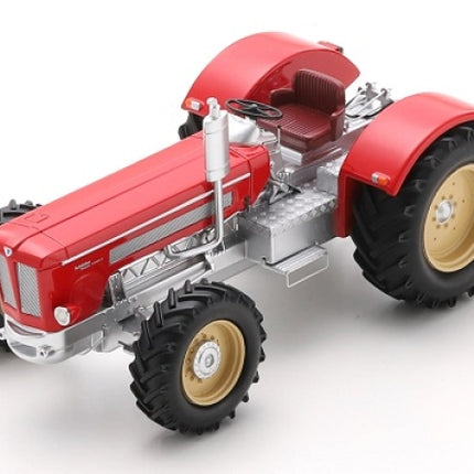 Red diecast model tractor with detailed engine, chrome accents, and large rubber wheels