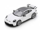 White 1:18 scale diecast sports car model with rear spoiler and black roof