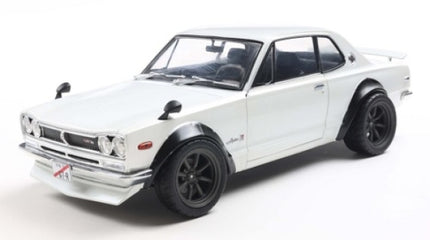 1:18 scale white diecast model car with black rims and flared wheel arches