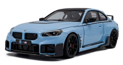 Light blue BMW M series 1:18 scale diecast model car with black accents and rear spoiler