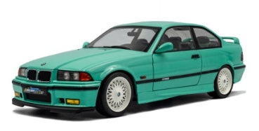 1:18 scale diecast model of a green BMW coupe with detailed wheels and black trim