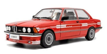 Red BMW 323i diecast model car 1:18 scale with sporty detailing, white background