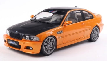 Diecast 1:18 scale orange BMW coupe model car with black hood and detailed rims