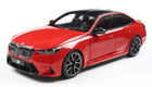 1:18 scale red BMW M sport diecast model car with black roof, detailed exterior