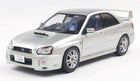 1:18 scale silver Subaru Impreza diecast model car with rear spoiler and detailed wheels